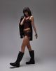 Motel Motel shrine stretch eyelet micro shorts in brown - 1
