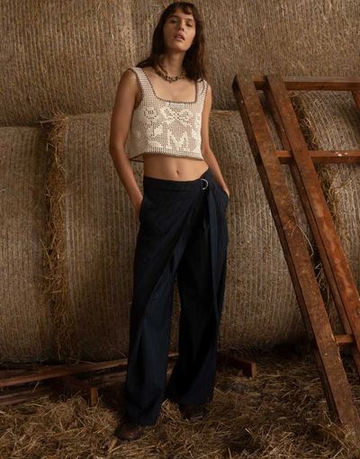 Muse Assembly Muse Assembly low rise baggy pants with skirt overlay in navy pinstripe