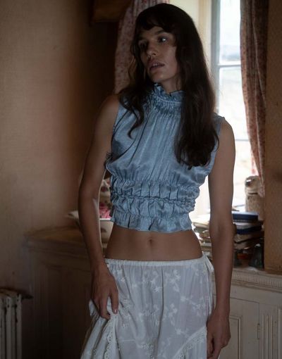 Muse Assembly Muse Assembly ruffle high neck crop shirred top in blue crushed satin