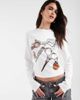 Muse Assembly Muse Assembly Victoria graphic long sleeve top in white - 1