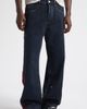 NAHMIAS NAHMIAS Destroyed Denim Track Pants - 1