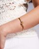 Neck On The Line Neck On The Line gold plated stainless steel knotted bangle bracelet - 1