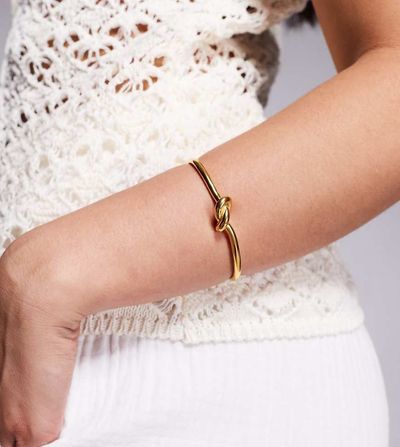 Neck On The Line Neck On The Line gold plated stainless steel knotted bangle bracelet