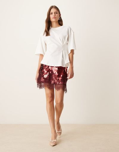 Never Fully Dressed Never Fully Dressed Maeva mini skirt in large sequin in burgundy with lace trim-Red