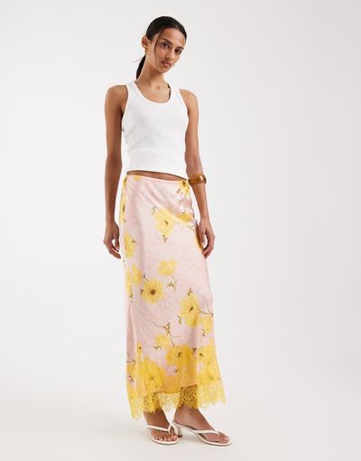 Never Fully Dressed Never Fully Dressed Maeva satin maxi skirt with lace trim hem in pink spot floral-Yellow