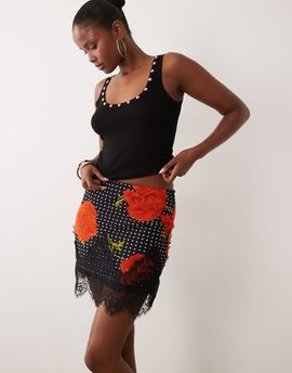 Never Fully Dressed Never Fully Dressed Maeva satin mini skirt with lace trim hem in black poppy print-Multi