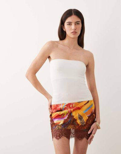 Never Fully Dressed Never Fully Dressed Rio mini skirt with lace trim in papaya print-Multi