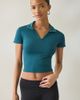 New Balance New Balance Tournament Cropped Short Sleeve Polo Top in Dark Green, Women's at Urban Outfitters - 1