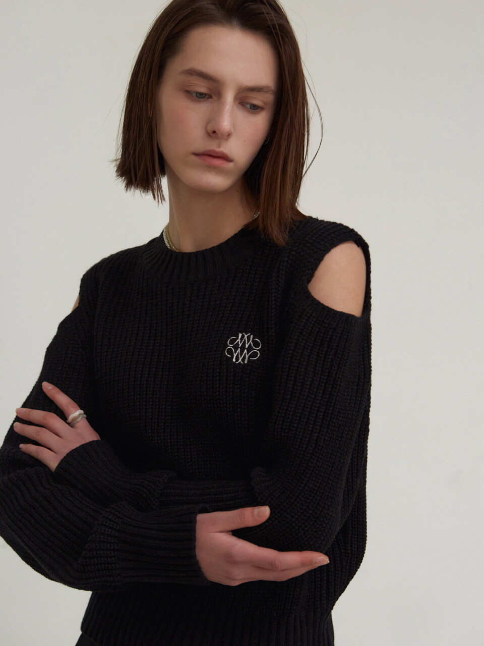 NICK&NICOLE Shoulder Cut Out Knit Top (Black)