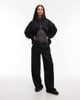 Nike Nike belted pintuck pants in black - 1