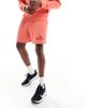 Nike Nike Club French Terry shorts with logo in orange - 4