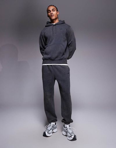 Nike Nike Club Wash cuffed sweatpants in dark gray