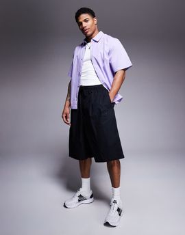 Nike Nike Club Woven oversized shorts in black