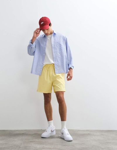 Nike Nike Club woven shorts in yellow