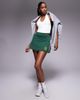 Nike Nike Court Club skort in dark green and beige - 1