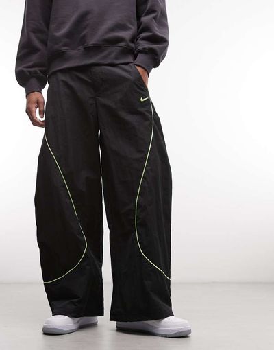 Nike Nike F.R.O.G wide pants in black and neon green