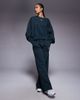 Nike Nike Phoenix Fleece oversized sweatpants in dark green - 1
