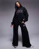 Nike Nike retro logo straight leg sweatpants in black - 1