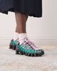 Nike Nike Shox TL sneakers in black, pink and green - 1