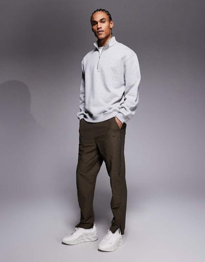 Nike Nike Solo Swoosh cuffed sweatpants in dark brown