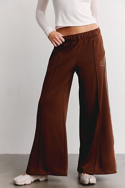 Nike Nike Sportswear Floral Logo Detail Mid-Rise Wide Leg Track Pants in Cacao/Sail, Women's at Urban Outfitters