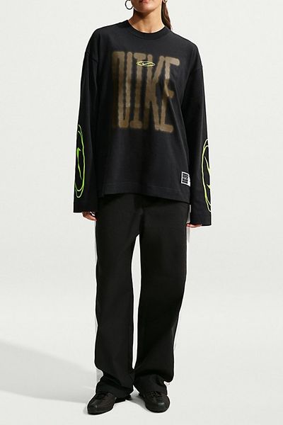 Nike Nike Sportswear Graphic Cotton Oversized Long Sleeve Tee in Black, Women's at Urban Outfitters