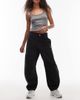 Nike Nike Street barrel leg pants in black - 1