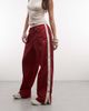 Nike Nike Street parachute pants in red and off white - 1