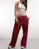 Nike Nike Street parachute pants in red and off white - 2