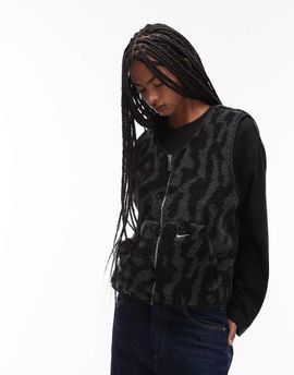 Nike Nike Street reversible sherpa vest in black and leopard print