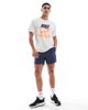 Nike Nike Stride shorts in blue and silver - 1