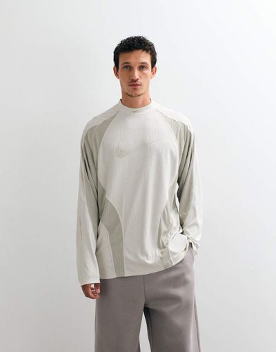 Nike Nike Tech Evolution jersey T-shirt in beige-Neutral