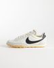 Nike Nike Waffle Racer sneakers in off white and black - 1