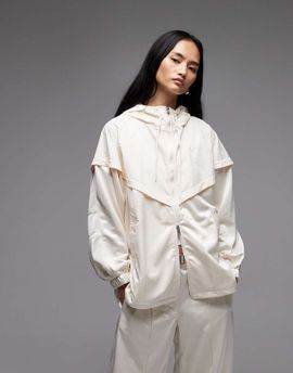 Nike Nike Windrunner hooded jacket in beige-Neutral