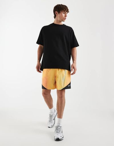 Nike Nike Windrunner shorts in orange