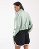 Nike Nike Windrunner track jacket in light green - 3