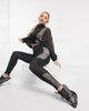 Nike Running Nike Running Fast cropped leggings in black and orange - 1