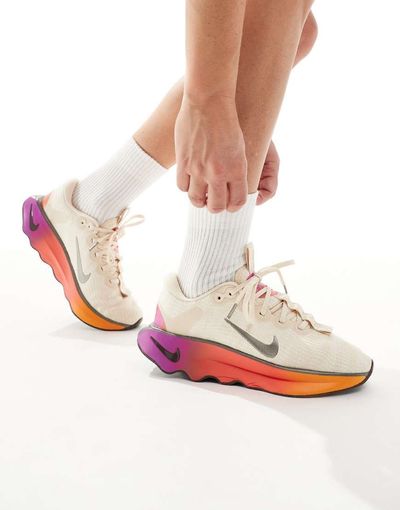 Nike Training Nike Motiva sneakers in white & gold