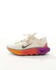 Nike Training Nike Motiva sneakers in white & gold - 2
