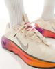 Nike Training Nike Motiva sneakers in white & gold - 3