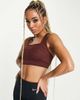 Nike Training Nike Training Dri-FIT Icon Clash all-over print bra in bronze-Brown - 3