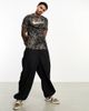 Nike Training Nike Training Dri-FIT Story Pack acid wash print T-shirt in dark beige-White - 2