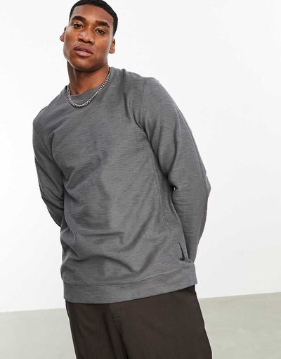 Nike Training Nike Yoga Dri-FIT Essential Fleece crew neck sweatshirt in gray