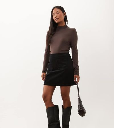 Nobody's Child Petite Nobody's Child Petite Russell cord front pocket detail mini skirt in black