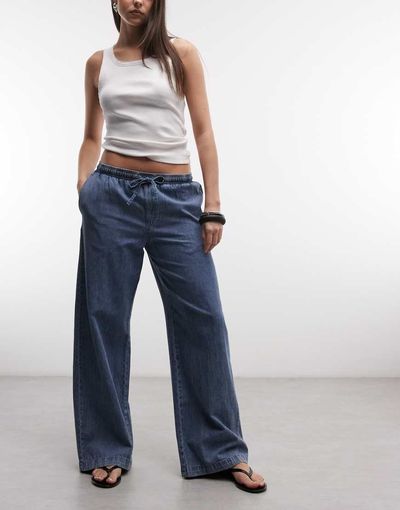 Noisy May Noisy May tie waist wide leg pants in washed blue denim