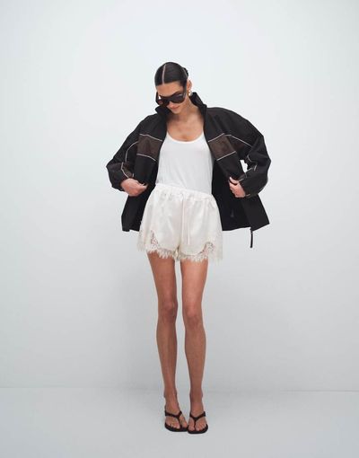 Noughts & Kisses Noughts & Kisses lace trim tie waist satin shorts in cream-Neutral