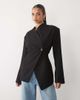 Noughts & Kisses Noughts & Kisses Naia wrap over cinch waist structured blazer in black - 1