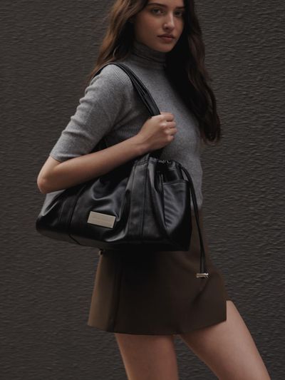 occur source Vegan Leather Adjustable String Eva Bag