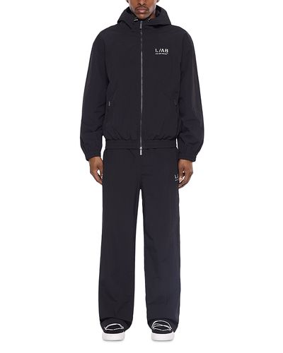 Off-white Off-White Relaxed Fit Reflective Diagonal Graphic Logo Track Pants