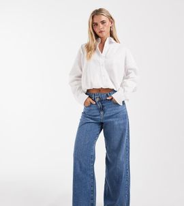ONLY Petite ONLY Petite Hope mid rise wide leg jeans with button detail in mid blue